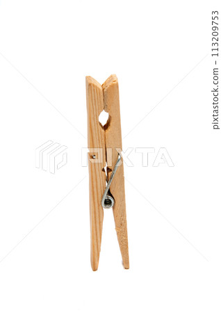 wooden clothes pegs isolated on the white wooden clothes pegs isolated on the white 113209753