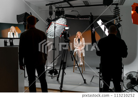 A woman at film studio set. Behind the scenes A woman at film studio set. Behind the scenes 113210252