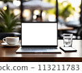 Open modern laptop with blank white screen mockup. Empty laptop screen on table in blurred cafe interior, mockup 113211783