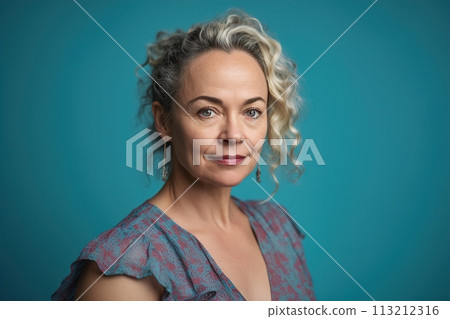 A woman with gray hair and red and blue floral print on her dress A woman with gray hair and red and blue floral print on her dress 113212316