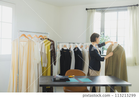Women working in the apparel industry Women working in the apparel industry 113213299