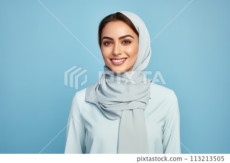 A woman wearing a scarf is smiling 113213505