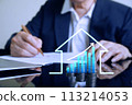 Icon Housing and diagram up trand on stacks of money on the table with blur background man sign real estate contact,  113214053