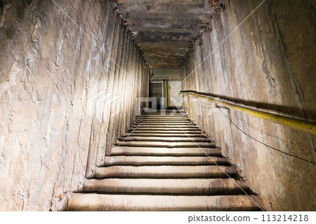 Dark underground staircase Dark underground staircase 113214218