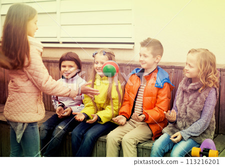 Laughing children playing with Ball on wooden platform Laughing children playing with Ball on wooden platform 113216201