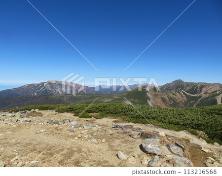 Northern Alps in late autumn (Mt. Washu and Mt. Yakushi seen from the ridgeline towards Mt. Sugoroku) Northern Alps in late autumn (Mt. Washu and Mt. Yakushi seen from the ridgeline towards Mt. Sugoroku) 113216568