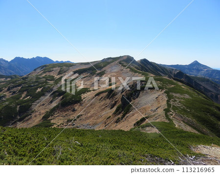Northern Alps in late autumn (view from the ridgeline from Mt. Mitsumata Renge to Mt. Sugoroku) 113216965