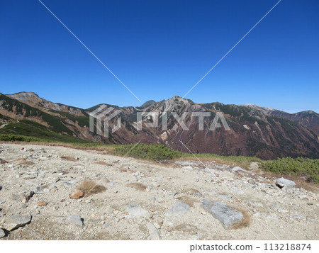 Northern Alps in late autumn (Mt. Washu seen from the mountain trail to Sugoroku hut) 113218874