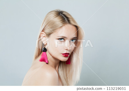 Glamorous blonde person portrait. Beauty woman with clear shiny fresh skin and blond hair Glamorous blonde person portrait. Beauty woman with clear shiny fresh skin and blond hair 113219031