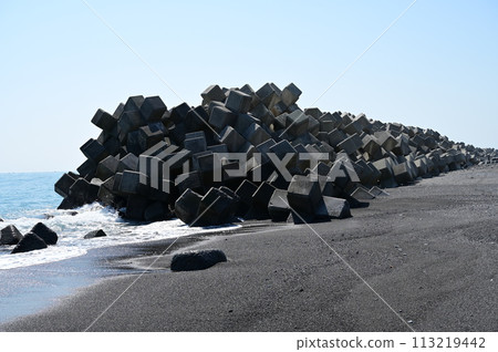 Wave-breaking blocks installed along the coast 113219442