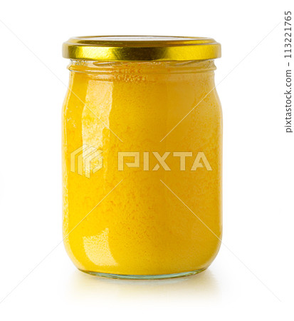 melted butter in a glass jar 113221765