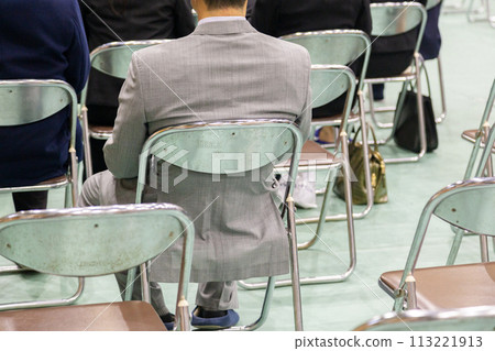 Parents (people) sitting on pipe chairs at graduation ceremonies, entrance ceremonies, and lectures. Parents (people) sitting on pipe chairs at graduation ceremonies, entrance ceremonies, and lectures. 113221913