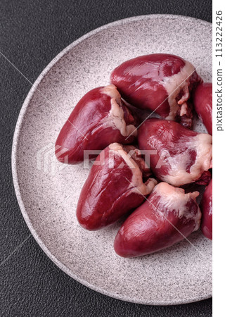 Raw turkey or chicken hearts with salt and spices 113222426