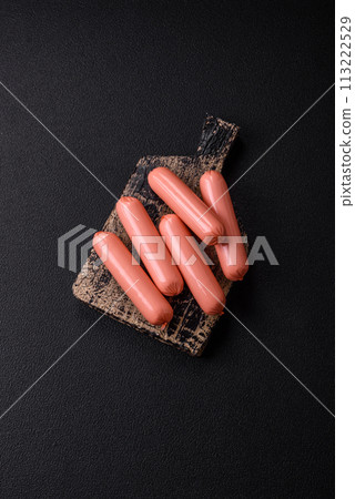 Delicious fresh vegetarian sausage or sausage made from vegetable protein tofu or seitan Delicious fresh vegetarian sausage or sausage made from vegetable protein tofu or seitan 113222529