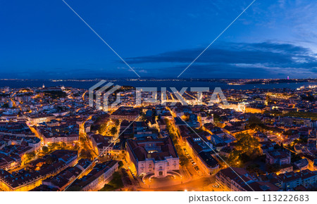Lisbon Skyline and Tagus River at Night. Blue Hour. Aerial View Lisbon Skyline and Tagus River at Night. Blue Hour. Aerial View 113222683