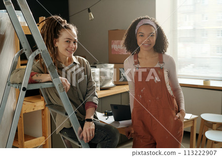 Happy young female interior designers Happy young female interior designers 113222907