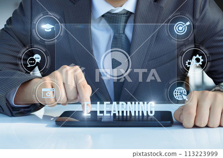 Man conducts e-learning on tablet computers. 113223999