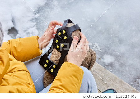 Use of studded overshoes on felted boots to improve traction on black ice. 113224403