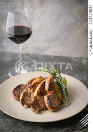 grilled lamb chops with red wine 113224622
