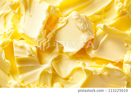 Closeup view showcases a yellow texture of creamy butter or margarine as background 113225610