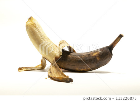 A peeled old rotten banana. The concept of shelf life. 113226873