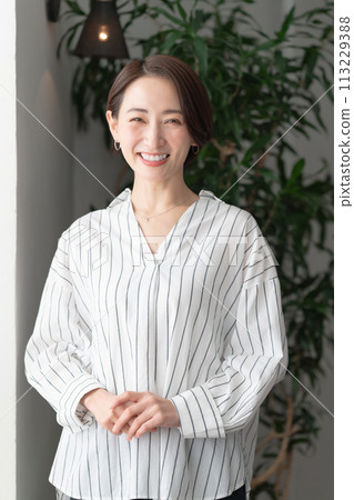 A woman with a smile 113229388