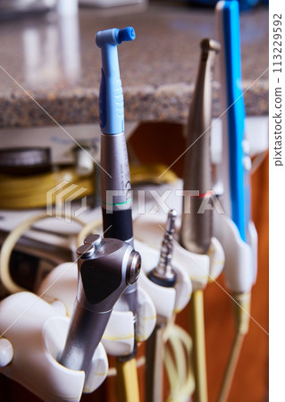 Dental Handpieces in Clinic Setting - Close-Up View 113229592