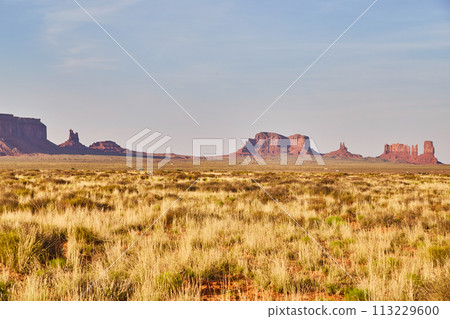 Golden Hour in Monument Valley with Mesas and Buttes Golden Hour in Monument Valley with Mesas and Buttes 113229600