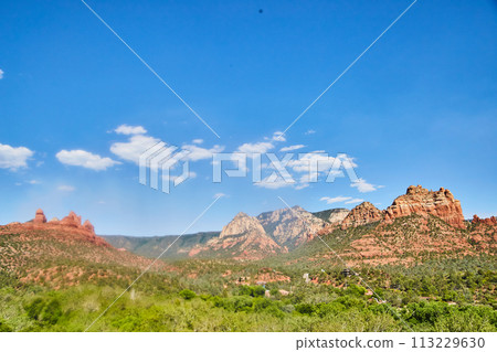 Sedona Red Rock Formations with Blue Sky and Clouds 113229630