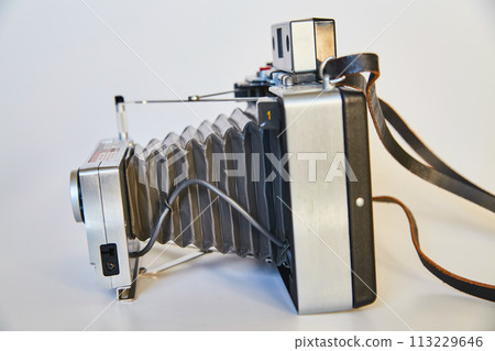 Vintage Bellows Camera Profile on White Background 113229646