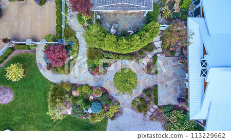 Aerial View of Lush Residential Garden with Stone Patio and Gazebo Aerial View of Lush Residential Garden with Stone Patio and Gazebo 113229662