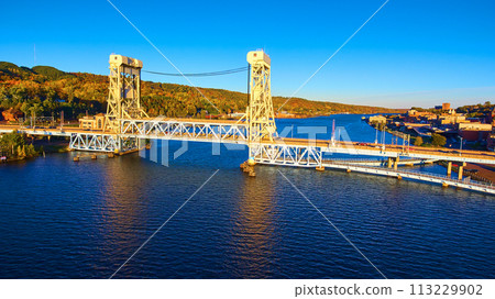 Aerial Golden Hour View of Portage Lake Lift Bridge and Autumn Foliage Aerial Golden Hour View of Portage Lake Lift Bridge and Autumn Foliage 113229902