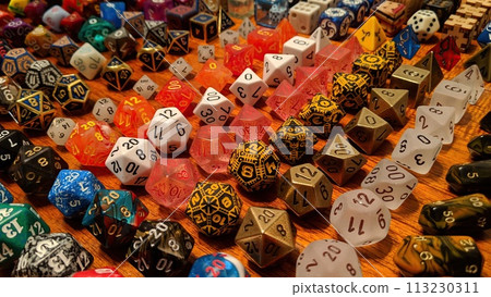 Vibrant RPG Dice Collection on Wooden Surface 113230311