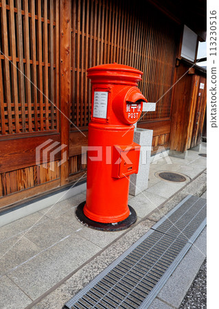 Red mailbox in Tondabayashi Jinaimachi 113230516
