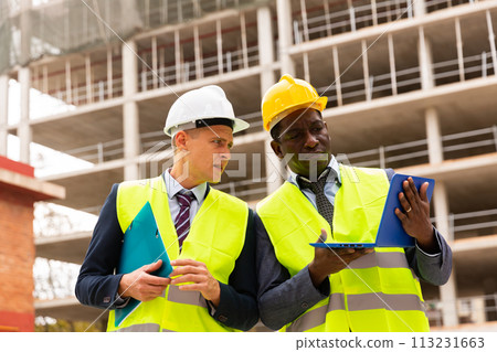 Two architects discussing construction project 113231663