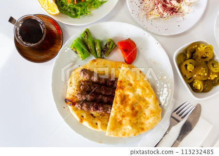 A traditional Turkish dish called Shish Kefte (Isparta sis Kofte). A traditional Turkish dish called Shish Kefte (Isparta sis Kofte). 113232485