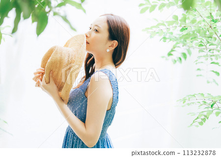 Young woman in summer clothes 113232878
