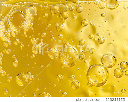 Background of delicate golden sparkling bubbles 113233155