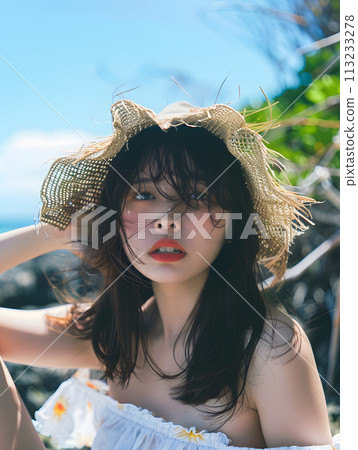 A portrait of a Japanese woman exuding natural charm under the blue summer sky A portrait of a Japanese woman exuding natural charm under the blue summer sky 113233278