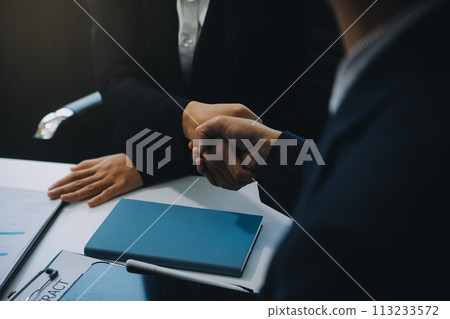 Businessman and Male lawyer or judge consult having team meeting with client, Law and Legal services concept. Businessman and Male lawyer or judge consult having team meeting with client, Law and Legal services concept. 113233572