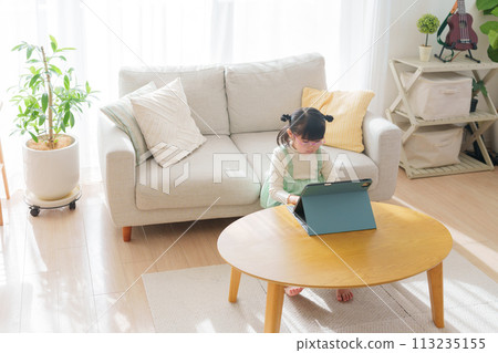 Children watching tablets 113235155