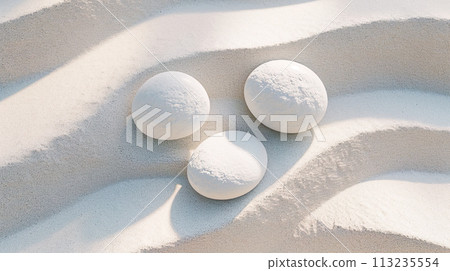 Beautiful white sand and three white round stones background 113235554