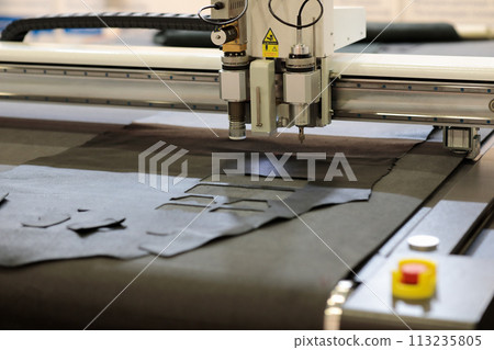 automatic flatbed digital cutting system close up automatic flatbed digital cutting system close up 113235805