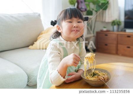 Child eating food Child eating food 113235856
