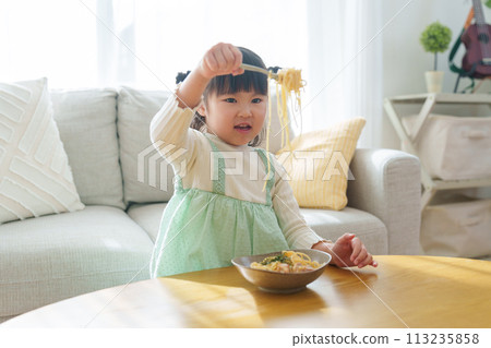 Child eating food Child eating food 113235858