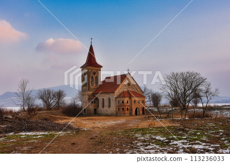 Beautiful old church of St. Linhart. Catholic temple village of Musov - Pasohlavky, Czech Republic. Photo of winter landscape with sunset on a dam New Mills (Nove Mlyny). Beautiful old church of St. Linhart. Catholic temple village of Musov - Pasohlavky, Czech Republic. Photo of winter landscape with sunset on a dam New Mills (Nove Mlyny). 113236033