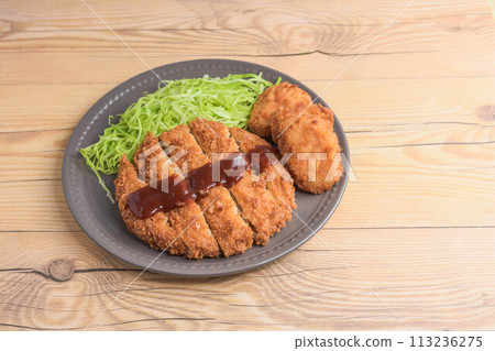 Assortment of croquettes and fried chicken 113236275