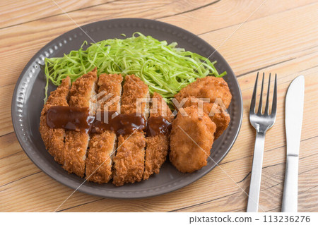 Assortment of croquettes and fried chicken 113236276