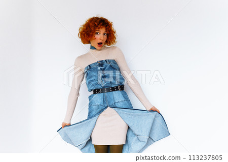 portrait red-haired curly teenage girl on white background 113237805