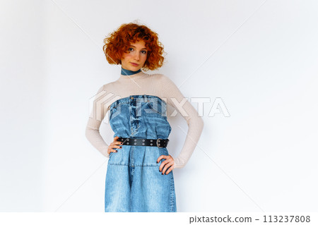 portrait red-haired curly teenage girl on white background 113237808